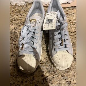 New size 8 Adidas sneakers